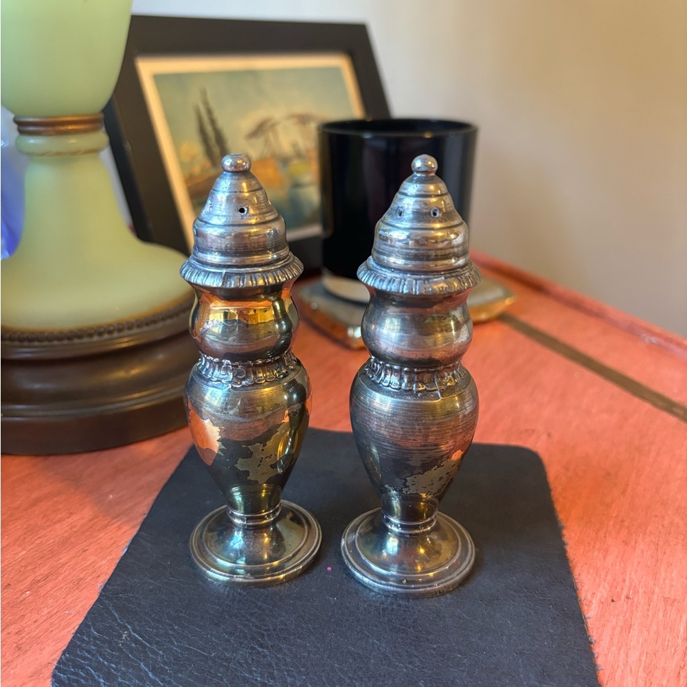 Pair of vintage antique silver salt and pepper shakers